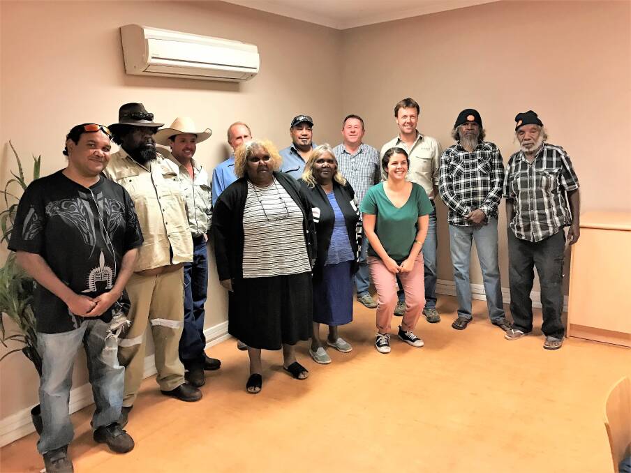 Kalium Lakes Ltd representatives, major shareholder, Beyondie Sulphate of Potash fertiliser project initiator, Pilbara cattleman and helicopter contractor Brent Smoothy (with white hat third left) and managing director Brett Hazelden (third from right) with members of the Mungarlu Ngurrarankatja Rirraunkaja Aboriginal corporation and their consultants after signing a native title agreement.