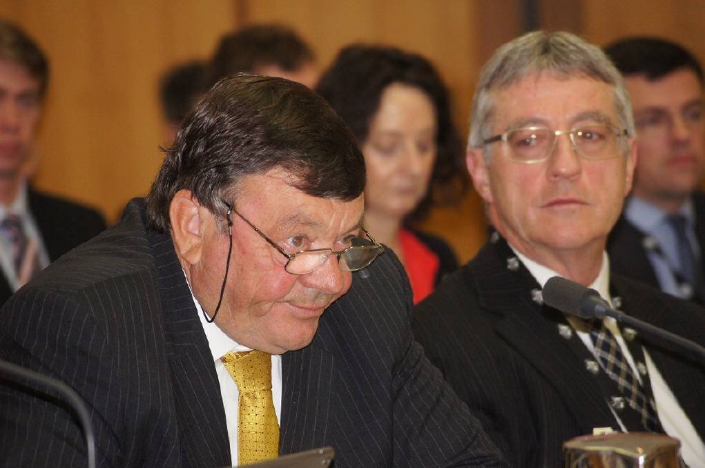  Australian Wool Innovation (AWI) chairman Wal Merriman (left) and Agriculture and Water Resources Department secretary Daryl Quinlivan at Senate estimates hearings in Canberra last October.
