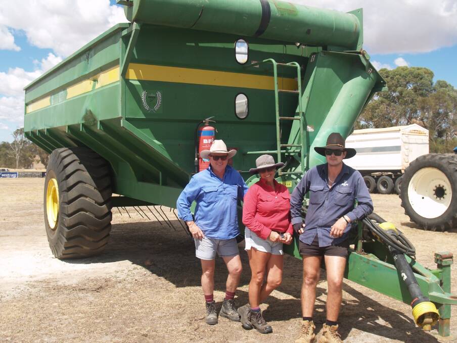 Lindsay (left), Kathryn and Aaron Honey, Mundijong, next to a Trufab Grain King 30t chaser bin which sold to a Kulin buyer at $37,000.