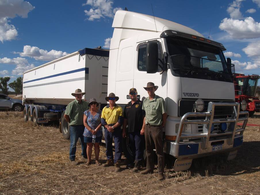 This 313 kilowatt (420hp) Volvo prime mover and trailer, topped the sale at $107,500. Pictured, from left, are Landmark auctioneer Steve Wright with vendors Adrienne and Dev Francisco, buyer of the prime mover Nigel Morrison, West Brookton and Landmark Wickepin agent Ty Miller (The trailer sold to a Williams concern). 