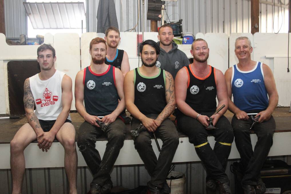 Some of the Australian Wool Innovation Shear Easy Quindanning 2018 class inside the shearing shed after a day of training. Across the front is Ethan Harder (19) (left) Bruce Rock, with Ben Simpson (23), Whangamata, New Zealand, Karl Terry (22), Katanning, James King (23), Narembeen and  Mark Buscumb, Quindanning. Above is AWI in-shed coach Wayne Hosie (left), Dubbo and AWI health and fitness coach