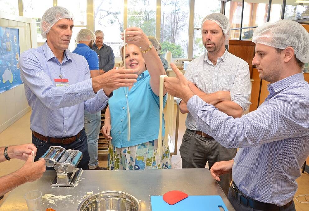 Darryl Borlase (left), ADM, Sonya Richard, AEGIC, Samuel Napier, Cargill and Joseph Panuccio, ADM, investigate the difference in noodles from using different flours at a recent AEGIC workshop. Photograph by AEGIC.
