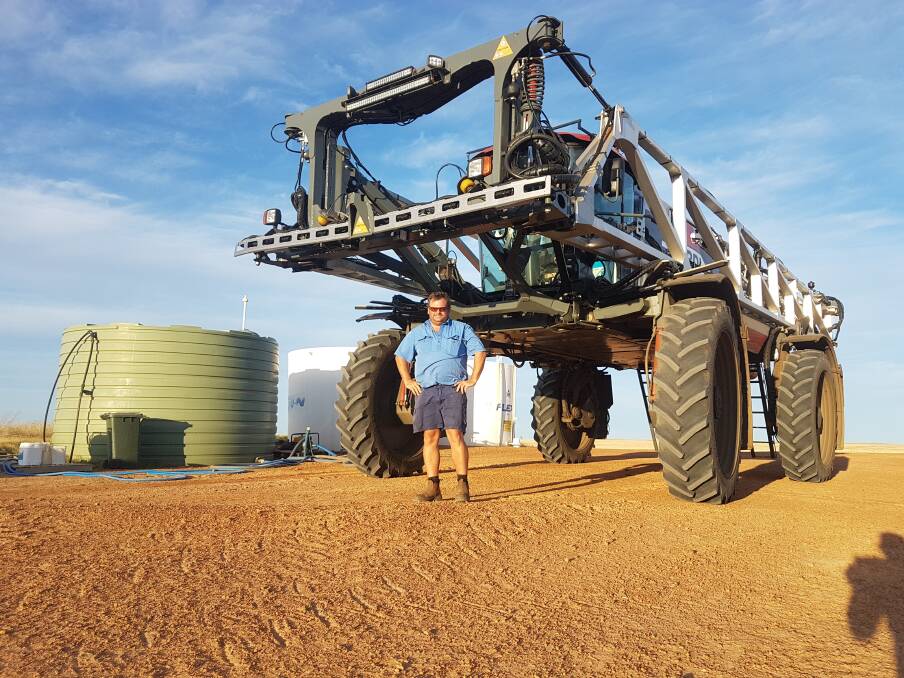  Marchagee farmer Clinton Hunt with his new RUBICON 9000 self-propelled boomsprayer equipped with Raven's Hawkeye Nozzle Control System. 