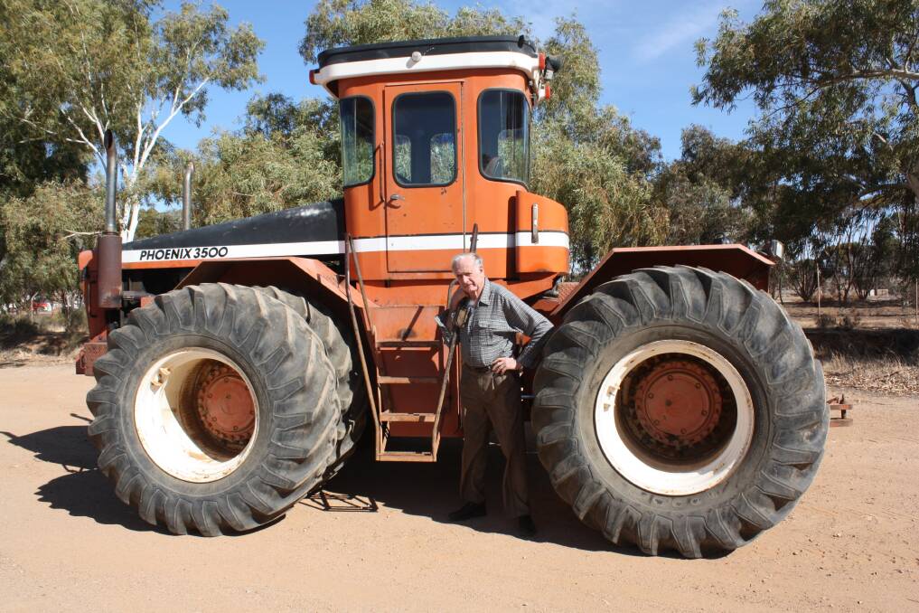 Phillbourne Merredin principal and inventor Laurie Phillips with the Phoenix 3500 4WD articulated tractor he bought last year. In its day it competed against major 4WD brands including Steiger, Versatile, John Deere, Massey Ferguson, Case and J I White.