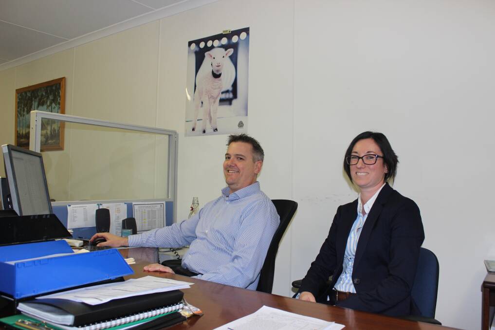 Australian Wool Exchange (AWEX) technical controller at the Western Wool Centre (WWC), Andrew Rickwood, shows AWEX wool technical officer Kate Brann, visiting from Sydney last week, how WA's wool market keeps setting price records. Kate works at the Yennora Wool Centre which is the New South Wales equivalent of the WWC.