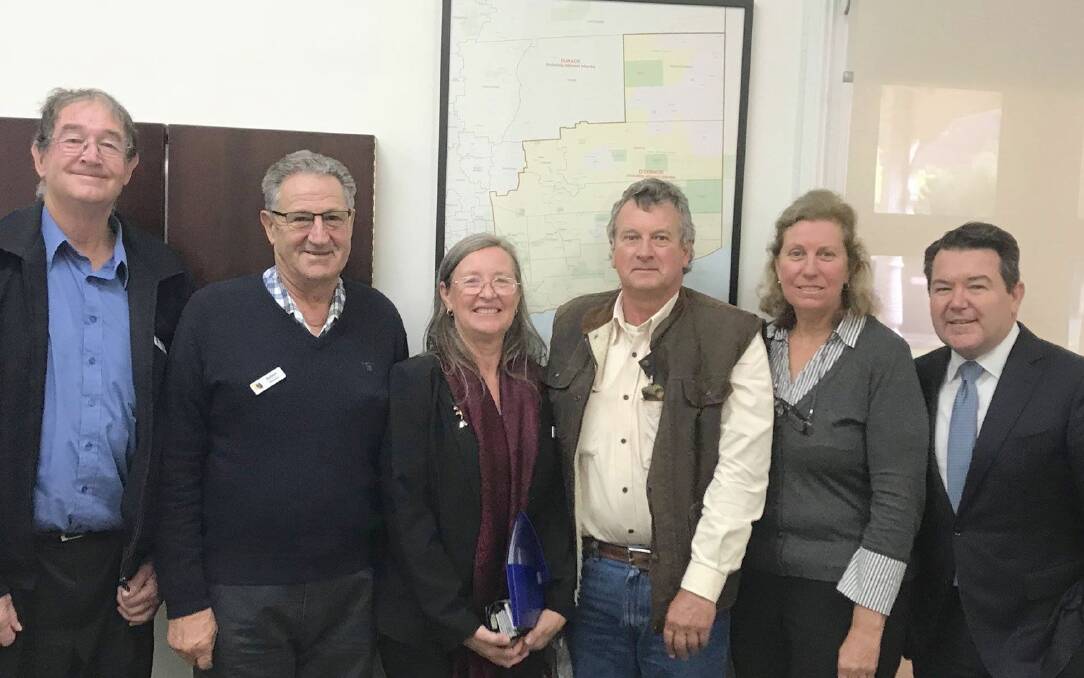 WA Grains Group committee members Doug Clarke (left), Robert Doney, Debby Clarke, Peter and Jenny Stacey and Senator Dean Smith at his electoral office in West Perth last week.