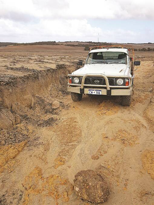 This ute remains where it ended after a flash flood on David Hayes' Badgingarra property two weeks ago. "A total of 140mm of rain was recorded in 10 minutes. It's going to take a while to fix this place," Mr Hayes said.