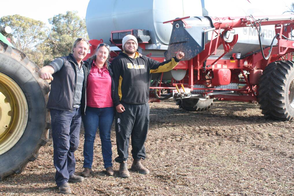 Shaun Westlake (left), with his drivers Jane Glass and Phil Aramoana with less than 100ha at seeding left recently. They seeded 2700ha this year.