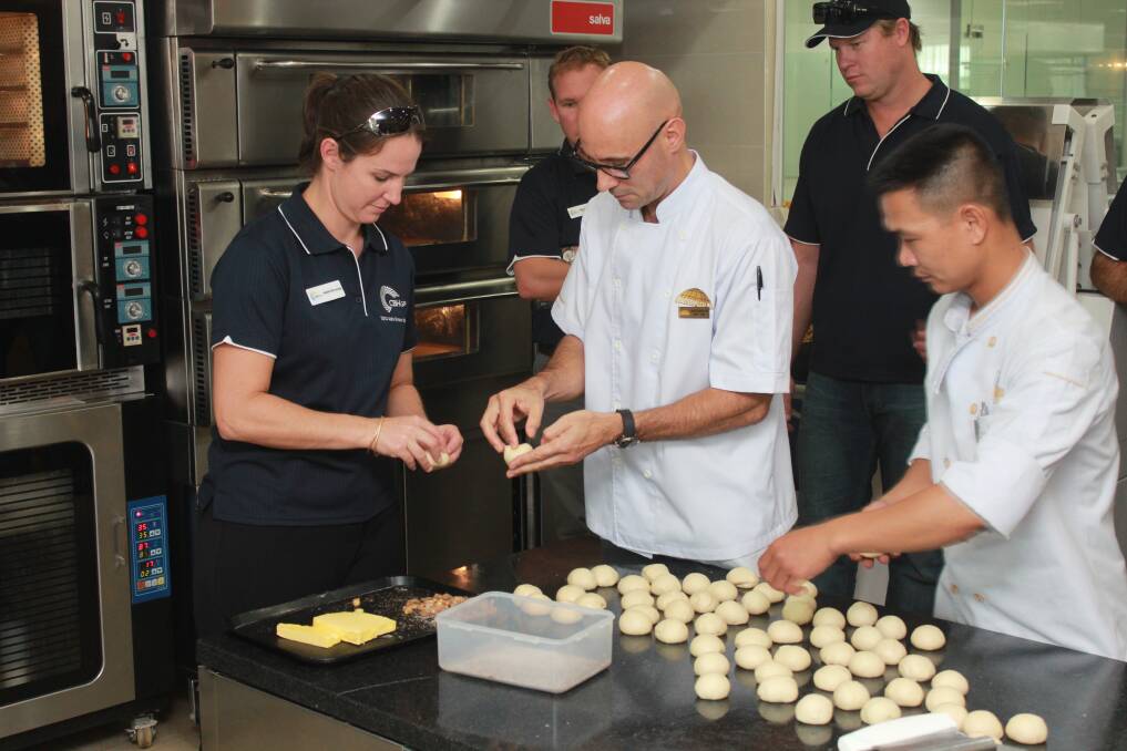 Kondinin farmer and CBH board director Natalie Browning learning to make Vietnamese bread during a 2014 CBH grower study tour that went through Japan, China and Vietnam.