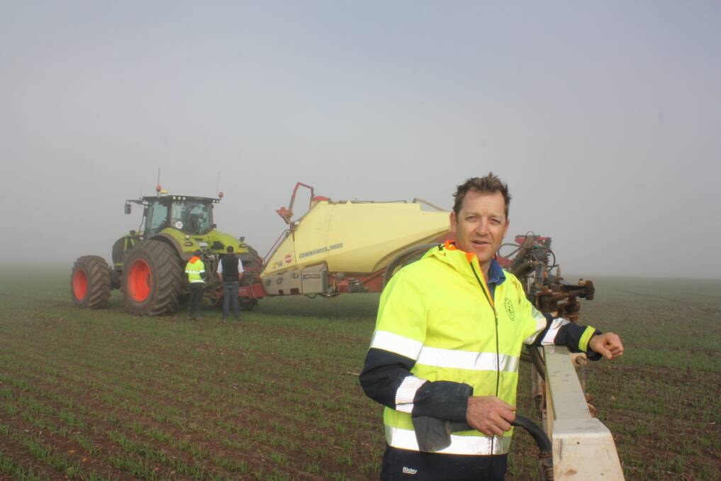Calingiri farmer John Young, waiting for the fog to lift for another day of spraying last week, in his CLAAS Axion 930 tractor, which was bought last year as the farm's main utility tractor. "Fuel consumption is surprisingly good," he said.