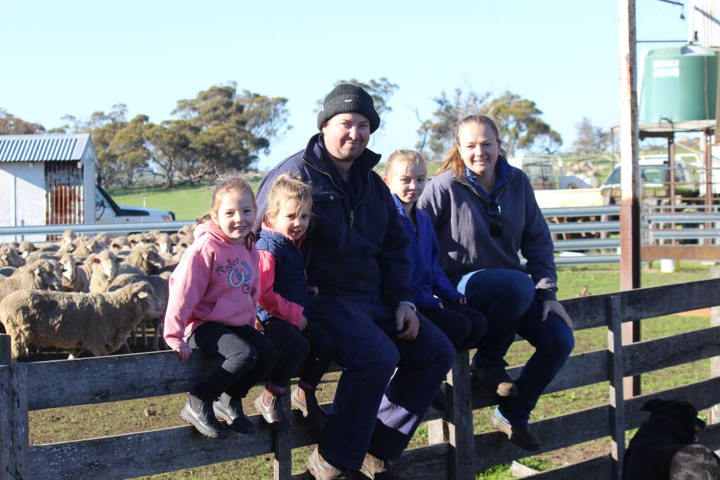 Darkan farmers Skye (left), Pia, Steven, Lexie and Katie Hulse all pitched in during lamb marking last week.