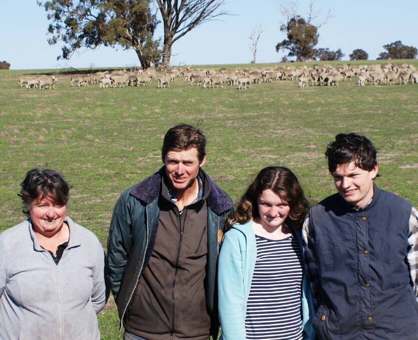 WAMMCO's Producers Of The Month for June 2018 Tracey and Ben Lamont, Tambellup, and their children Stephanie and Brendan with a mob of April-drop lambs and older ewe mothers.