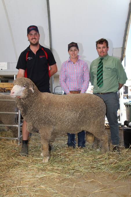 With the $8250 top-priced ram purchased by Martindale Pty Ltd, New Norcia, at the 13th annual Manunda on-property Poll Merino ram sale at Tammin last week were Luke Button (left), Manunda stud, Rebecca Martin, Martindale Pty Ltd livestock manager and Mitchell Crosby, Landmark Breeding.