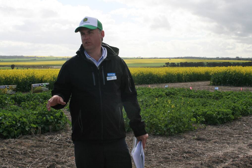  Advanta Seeds canola technical manager Karl Schilg explaining the Monsanto Advanta Seeds trial for effective control of stacked canola volunteers.
