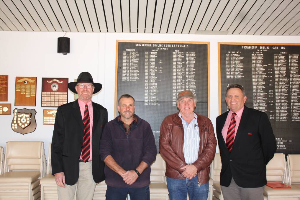 Cwmavon, Gnowangerup was sold at auction by Elders Real Estate rural specialist Jeff Douglas (left) to Peter and Michelle Dewar, Broomehill, with vendor Michael Lance and Elders Real Estate sales executive – WA rural Jim Sangalli.