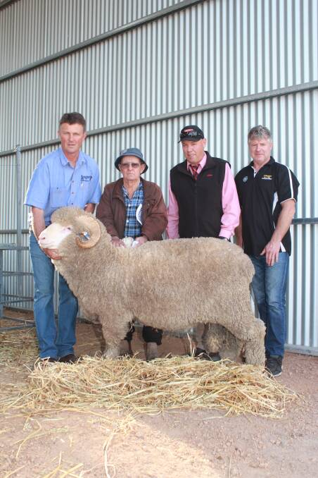 Angenup stud co-principal Gavin Norrish (left), Tom Marshall, Cranbrook, Peter Wharton, Elders Kojonup and Rob Johnson, who works for Mr Marshall, with one of the rams bought by the Marshall operation at the Angenup on-property sale on Monday. Mr Marshall bought six rams in total including the $6200 top-priced ram of the sale.