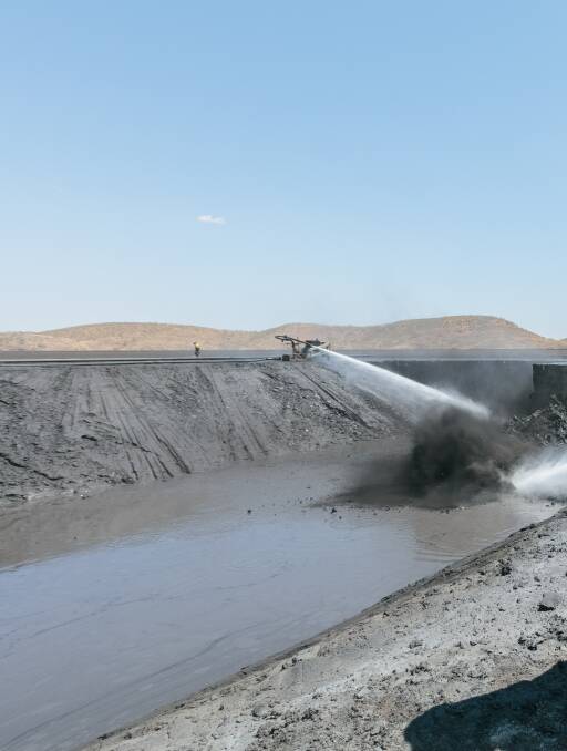 HYDRAULIC MINING: High pressured water cannons are shot to re-slurry the tailings and pump them up to process plant where zinc concentrate is extracted for sale.