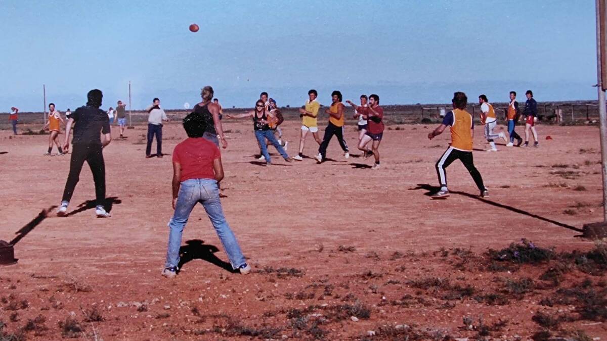 A football match held at Rawlinnas muster grounds between the railways employees and pastoralists.