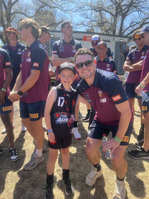 Pippa with 2023 AFL Brownlow medallist Lachie Neale from the Brisbane Lions. Photo by NAB AFL Auskick.