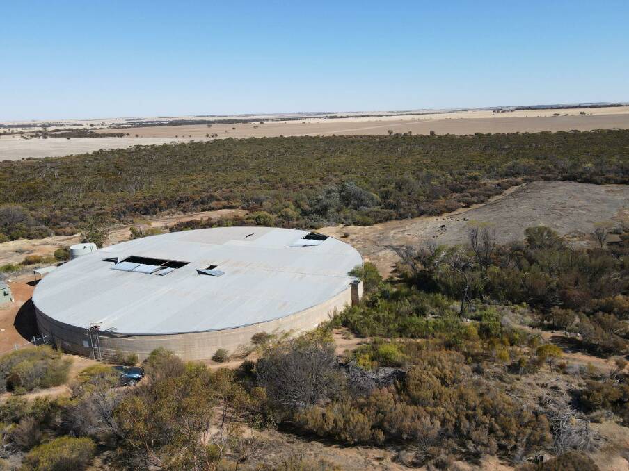 Built over about 12 hectares of rock, Pingarings cement catchment wall guides water into the two-million gallon concrete storage tank, through troughs, open drains and a main pipe.
