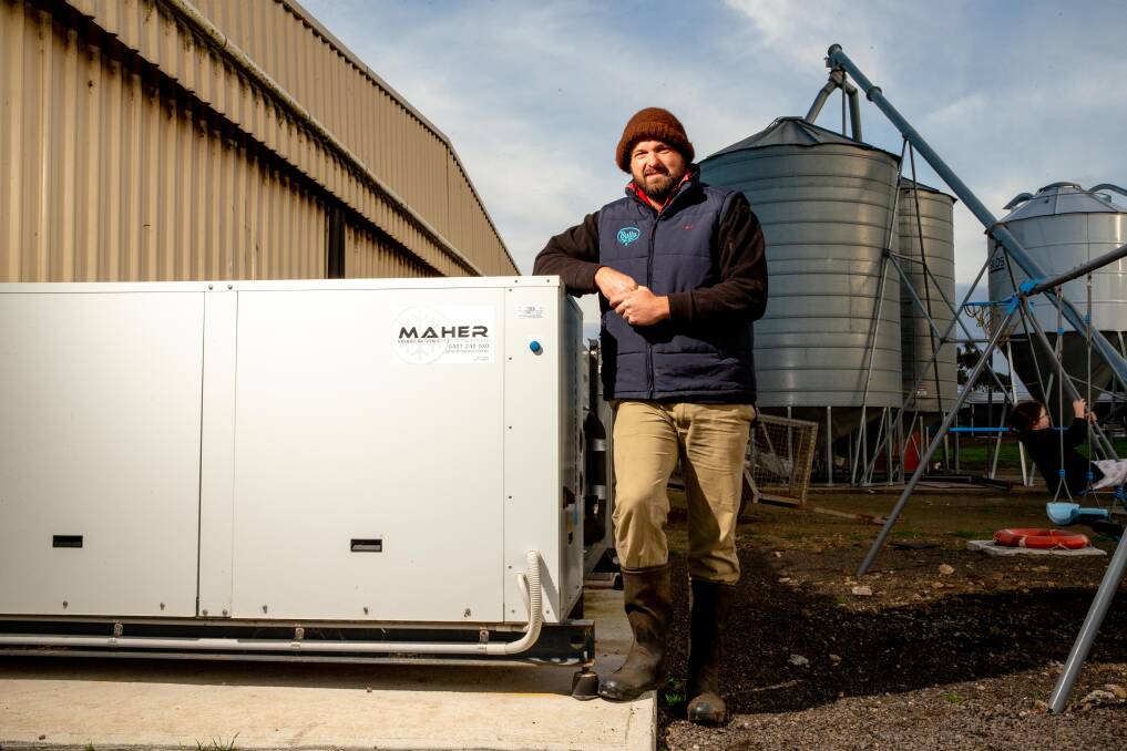 NEW TECH: Peter Doolan stands next to his sustainable cooling system. Picture: Chris Doheny