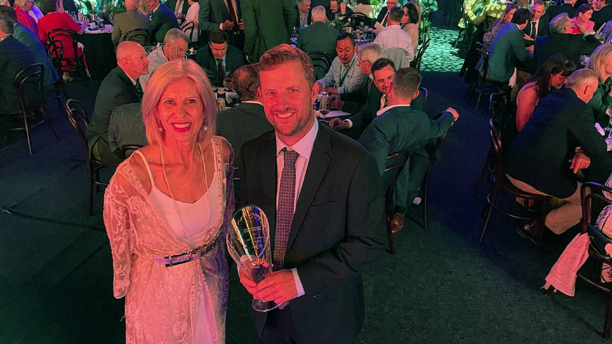 ACM group commercial manager Corinne Whiteman with QCL's Red Meat Achiever Award winner Adam Coffey. Picture by Shan Goodwin. 