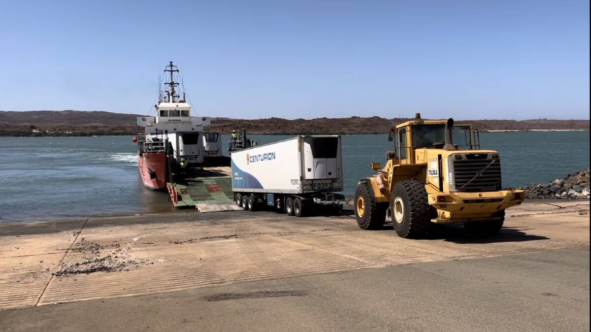 The first barge to leave Dampier towards Broome, carrying five truck trailers comprising close to 110,000 kilograms of food supplies from Woolworths and Coles. Picture by DFES Media