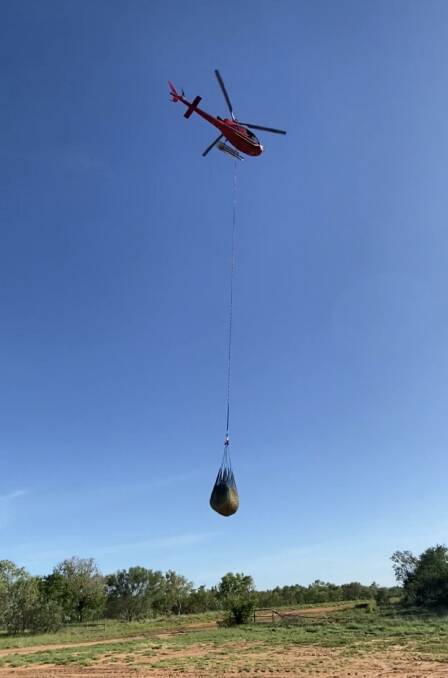 Derby-based Frontier Helicopters slinging a hay bale to Gilligan's Island. Ordinarily they would be helping with mustering.