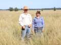 CARBON AND CATTLE: Moolan Downs manager Dean Hurley and assistant manager Shelby Davis.