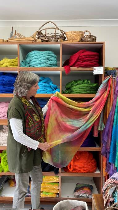 Nancy Ballesteros sells three kinds of silk material at her shop. Shown here is her Paj silk fabric in the colourway called Fiesta.
