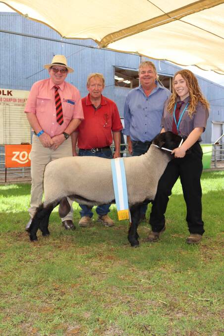 A ram from the WA College of Agriculture Narrogins Collegian stud was awarded reserve champion Suffolk ram, and is held by student Zaria Francis, Elders stud stock agent Michael ONeill (left), Collegian technical officer Colin Batt and judge Grant Bingham, Williams.