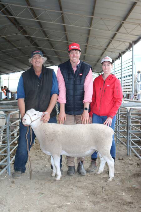 With the $1400 top-priced White Suffolk were Arra-dale stud co-principal Les Sutherland (left), Elders Mid West livestock agent Tom Page, who bought the ram on behalf of a first time buyer and Casey Gill, Elders, Carnamah.