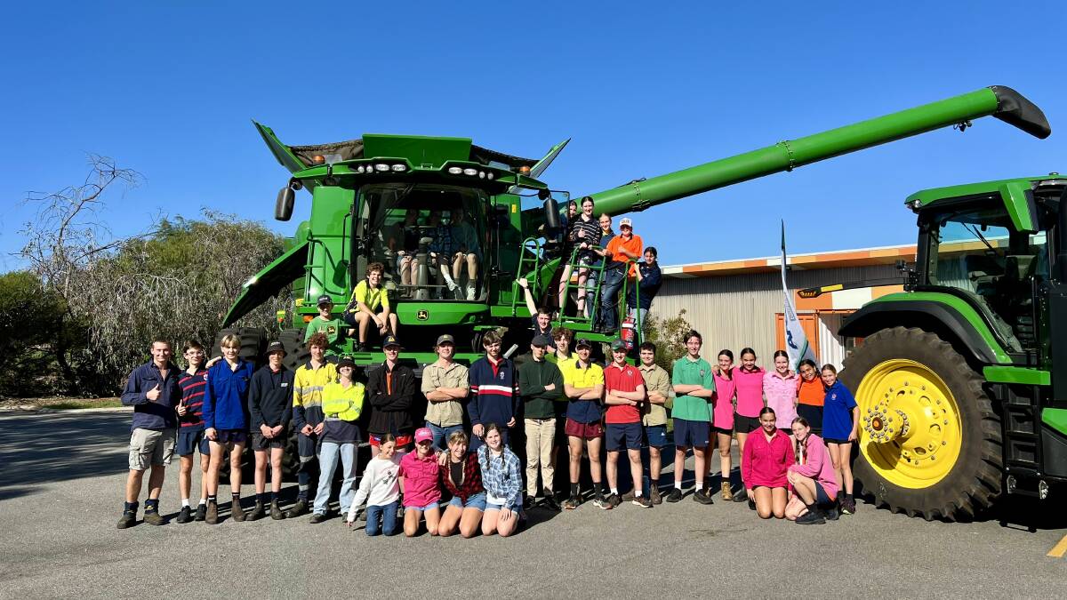 Great Southern Grammar students of all year levels enjoyed the field day and here are standing in front of a harvester and tractor supplied by AFGRI Equipment.
