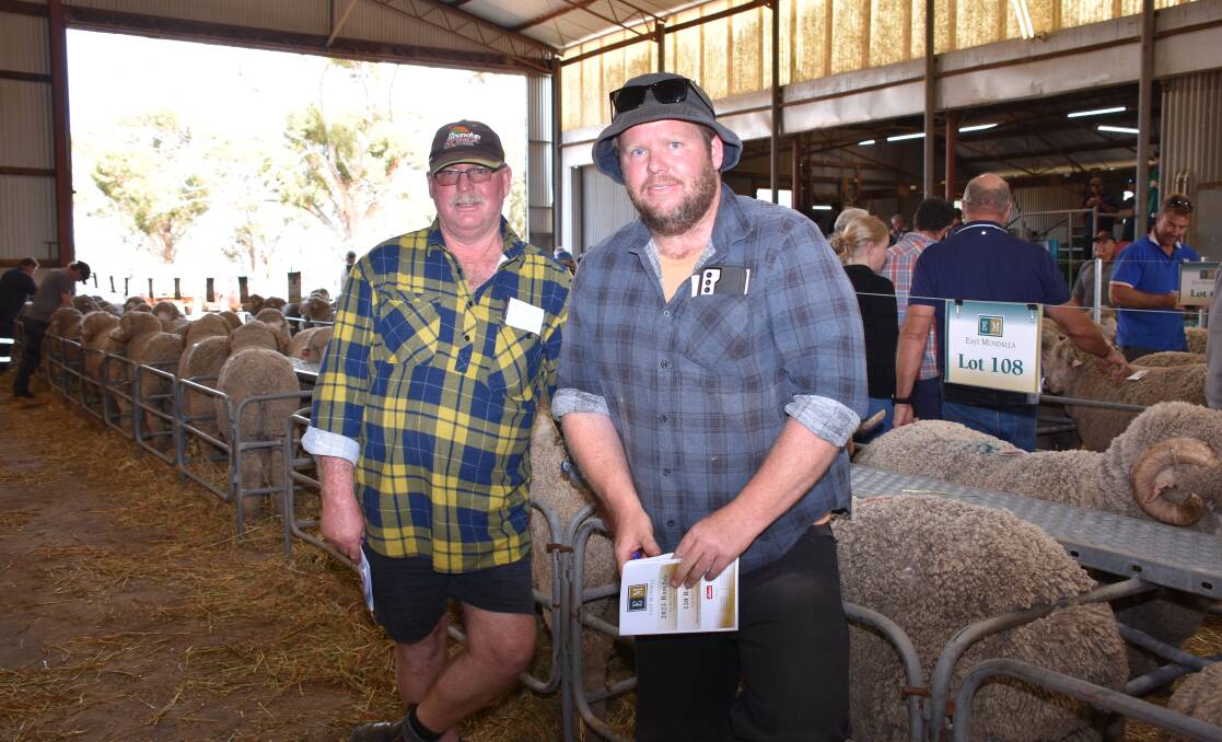 Looking over the line-up of rams prior to the sale were David (left) and Callan Tonkin, Newdegate. In the sale David purchased nine rams at an average $2867 and Callan purchased four rams at an average of $2425.
