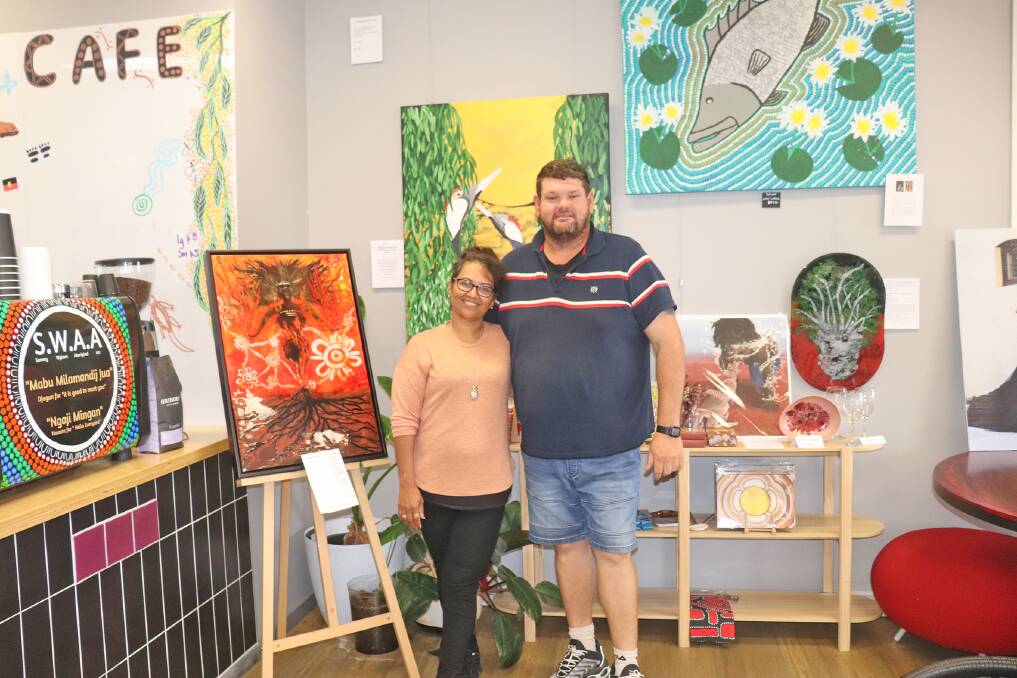 Ms Wyborn and husband Dave among the art at Sammy Wyborn Aboriginal Art.