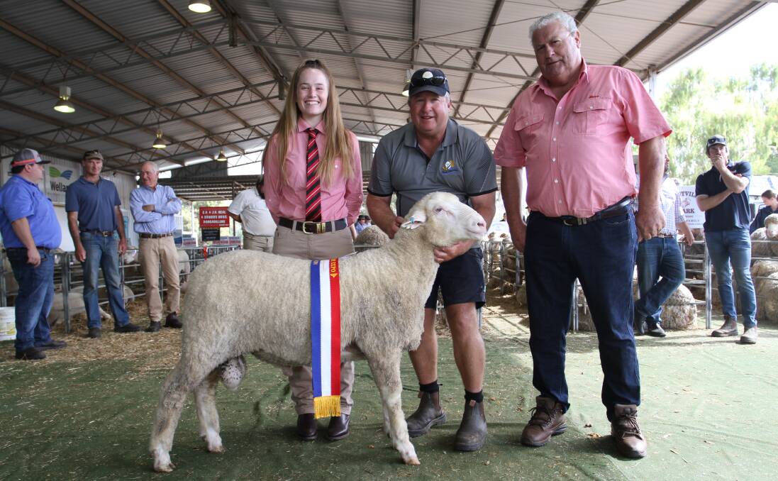 Sunny View stud, Wagin, was awarded the champion autumn shorn exhibit at this years Act Belong Commit Williams Gateway Expo. Holding the Poll Merino ram is Sunny View stud principal Gavin Kirk and was congratulated by award sponsors Lauren Rayner and Kevin Broad, Elders stud stock.