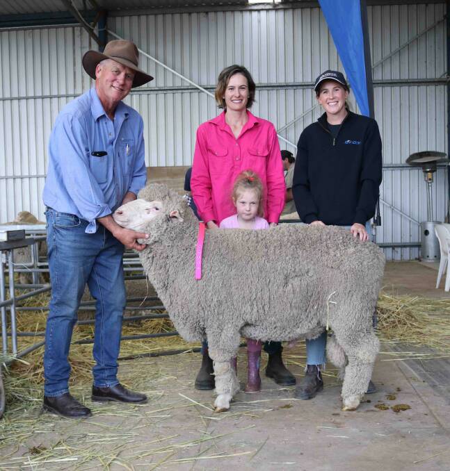 Ejanding once again put up a ram in support of the Shearing for Liz Pink Day fundraising, which was bought by Adam Metcalf, Dowerin. Mr Metcalf bought the ram for $3100 for his daughter Skyler, 5, who is pictured with Ejanding stud principal Brett Jones, her mum Deanna Hansen and Ejanding representative Shanae Jones.