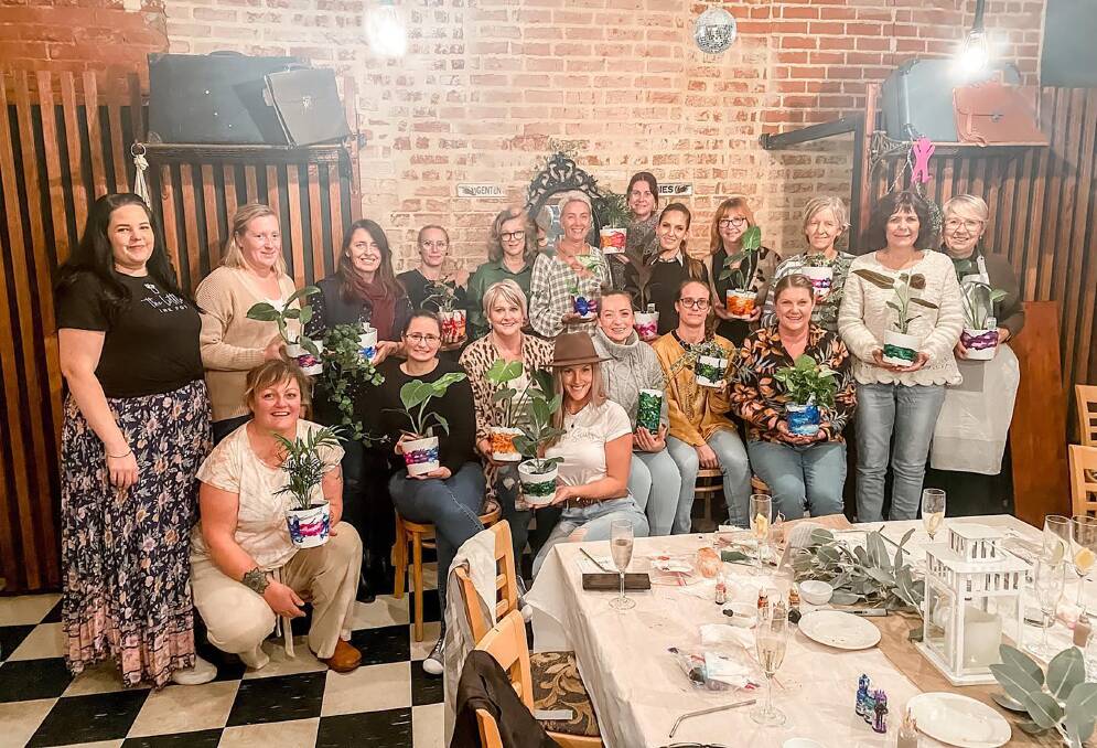 The group from a plant workshop.Ms Jasper said she loves rural life, but living remotely meant there was a greater need to socialise and have hobbies. Her workshops sell out in a couple of hours, emphasising the need for women to connect with each other and create.
