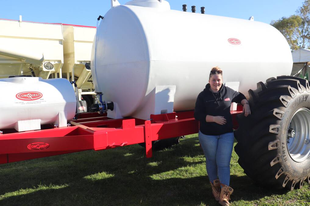 Conquest marketing officer Fran Kanall in front of the new Conquest liquid fertiliser cart released last week.