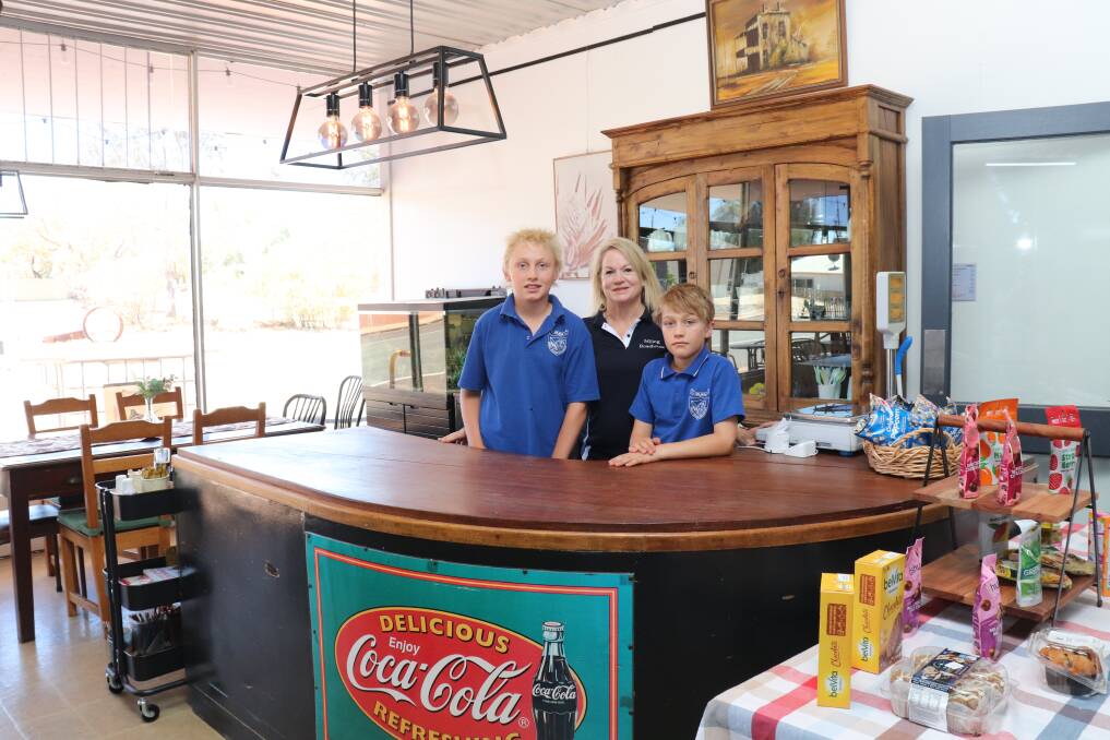 Peta Thorniley and her two sons, Xavier (left) aged 11, and Mitchell, 9. The roadhouse is a welcoming, calm environment with comfortable chairs, hot coffee and a television. Ms Thorniley said as the boys spend a lot of time at the roadhouse, she wanted to make it a comfortable place to rest.