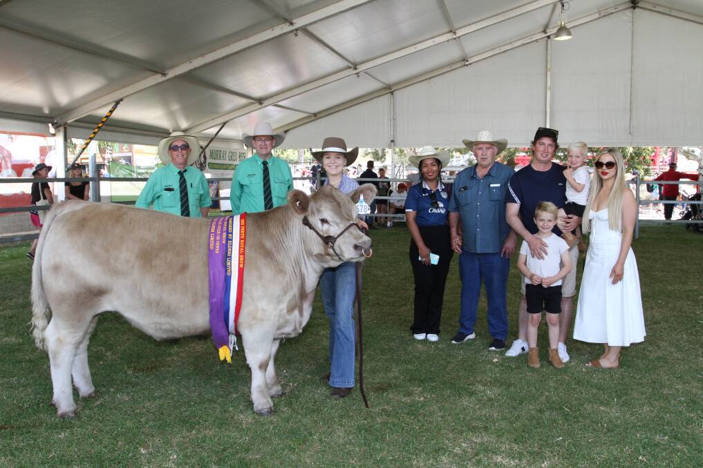 The grand champion and champion heavyweight steer or heifer was exhibited by Ella Clarke, Harvey, and sold for the sales $8200 second top price. With the 520kg Square Meater steer were Nutrien Livestocks Damian Halls (left) and Tiny Holly, Ella Clarke, buyers Apple Chairan, Ross Waddell, Nathan and Brittany Johns and their sons Logan and Reagan, The Meat Machine, Maddington.