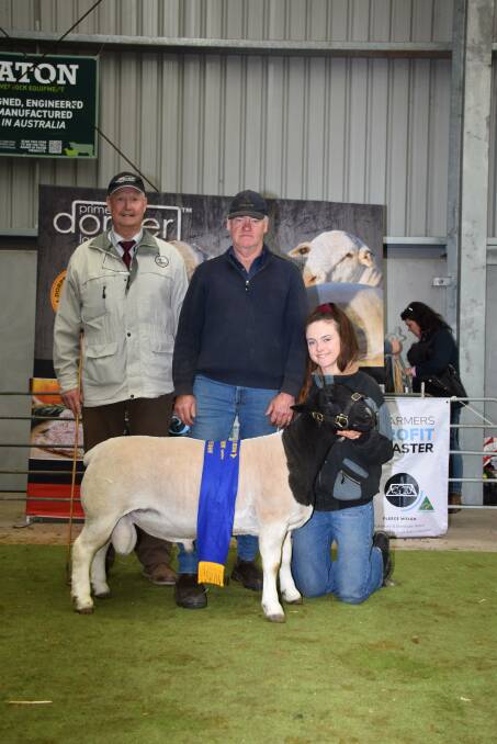 With the champion junior Dorper ram exhibited by the Kaya stud, Narrogin, were judge Wicus Cronje (left), Mildura, Victoria, Kaya stud principal Adrian Veitch and daughter Meaghan.