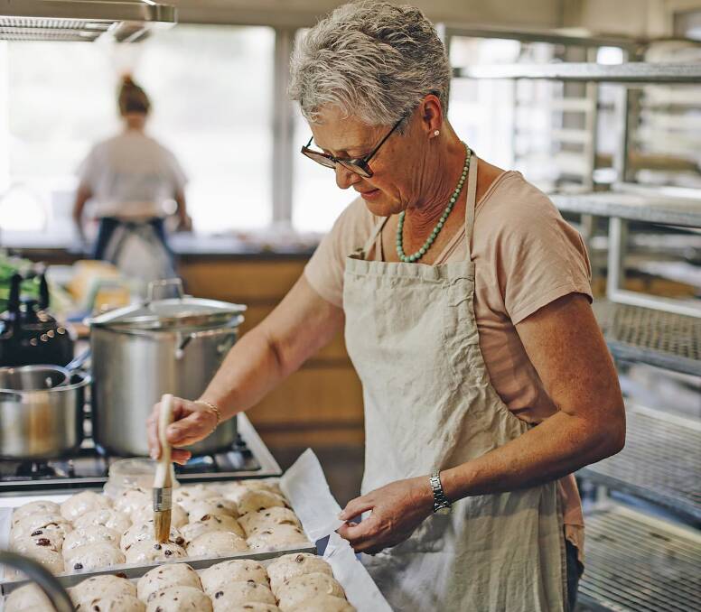 Tiff Brown's mum, Victoria, working on some hot cross buns. 