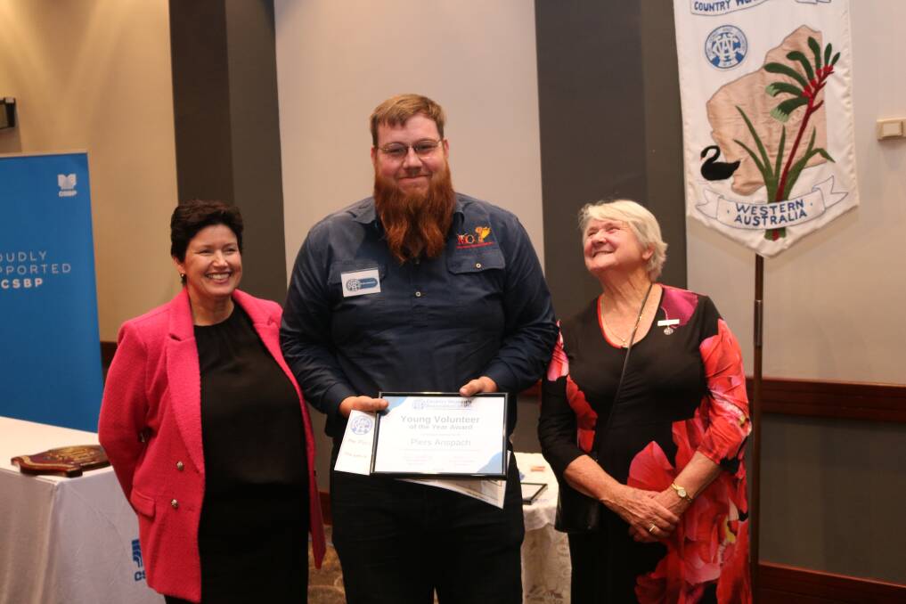 Piers Anspach, 18, won the young volunteer of the year award, presented by WA Agriculture and Food Minister Jackie Jarvis (left) and CWA State president Anne Gething.