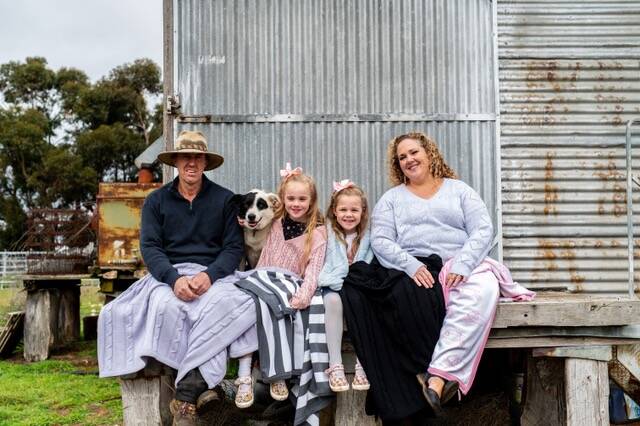 Rod McErvale with his daughters, Maddison, 9 and Isla, aged 7, wife Rebecca and Bruiser the dog.