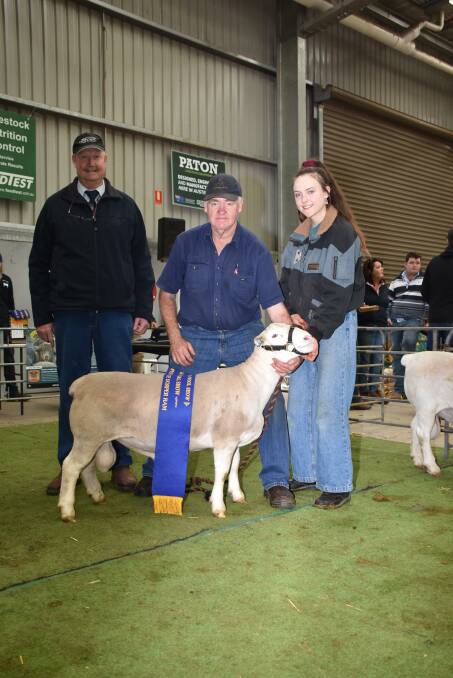 The Kaya stud, Narrogin, exhibited the champion junior White Dorper ram of the show. With the ram were judge Wicus Cronje (left), Mildura, Victoria, Kaya stud principal Adrian Veitch and daughter Meaghan.