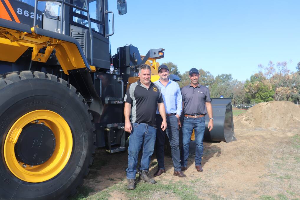 Matt Chapman (left), All Excavator Hire, Landsdale, Mike Foskett, McIntosh & Son, Perth and Johnny Inferrera, McIntosh & Son Distribution with the LiuGong 862H wheel loader.