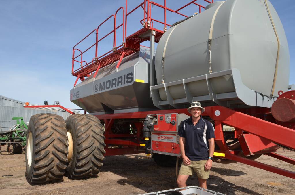 Nathan Mudie, GM & EV Mudie, West River, paid $230,000 for the Morris 9445 air seeding cart and $166,000 for the DBS Auseeder E-Series seeding bar behind it, but had to win nerve-testing bidding duels to claim both.