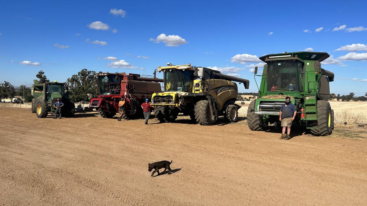 The family in front of their machines, ready for the harvest that only recently finished. 