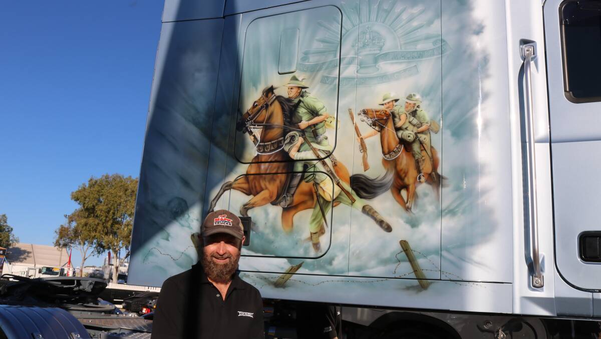 Mr Cowling with the mural on the other side of the Bairstows truck, which is equally as impressive.